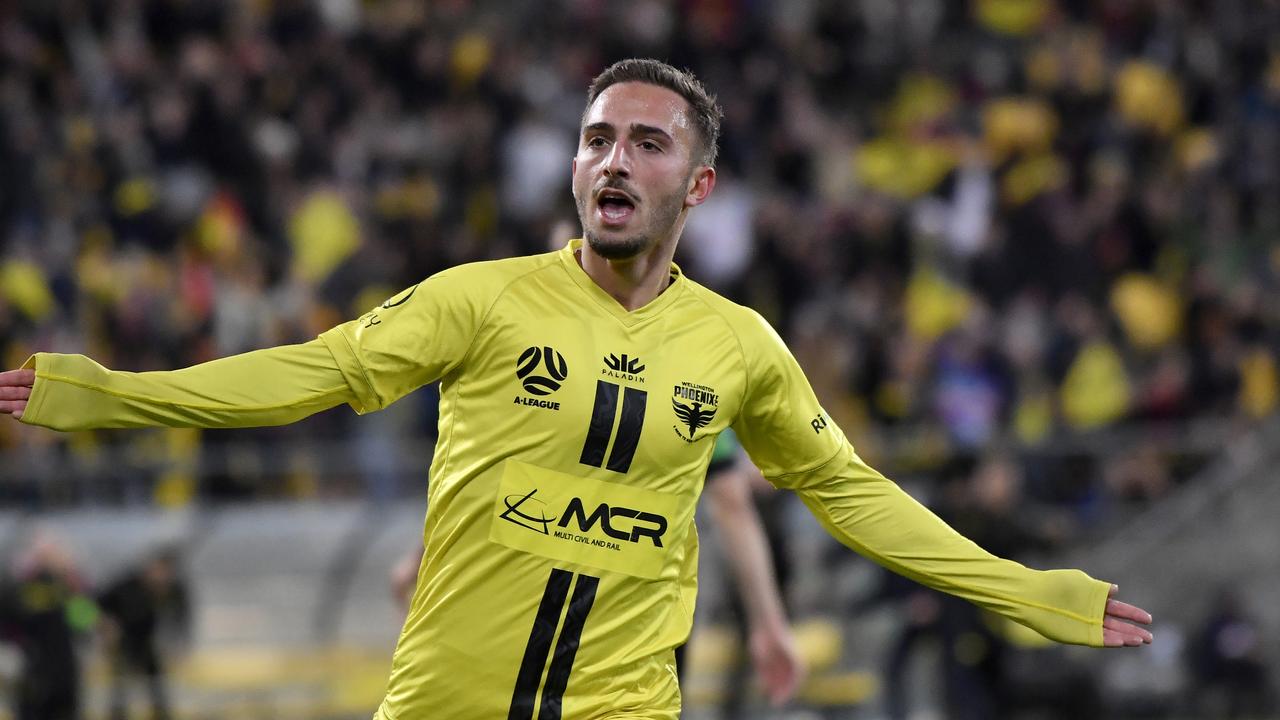 Reno Piscopo scores in front of a strong crowd in Wellington in their return home. Photo: Getty Images