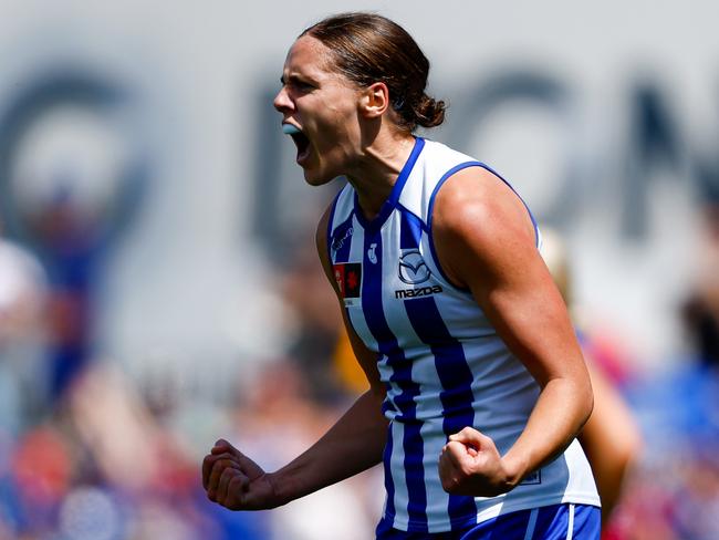 MELBOURNE, AUSTRALIA - DECEMBER 03: Jasmine Garner of the Kangaroos celebrates a goal during the 2023 AFLW Grand Final match between The North Melbourne Tasmanian Kangaroos and The Brisbane Lions at IKON Park on December 03, 2023 in Melbourne, Australia. (Photo by Dylan Burns/AFL Photos via Getty Images)