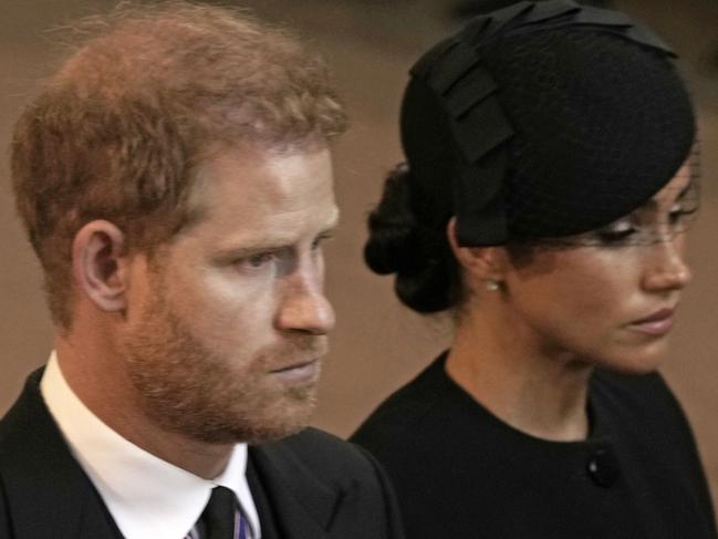 LONDON, ENGLAND - SEPTEMBER 14: Prince Harry, Duke of Sussex and Meghan, Duchess of Sussex leave Westminster Hall on September 14, 2022 in London, United Kingdom. Queen Elizabeth II's coffin is taken in procession on a Gun Carriage of The King's Troop Royal Horse Artillery from Buckingham Palace to Westminster Hall where she will lay in state until the early morning of her funeral. Queen Elizabeth II died at Balmoral Castle in Scotland on September 8, 2022, and is succeeded by her eldest son, King Charles III. (Photo by Nariman El-Mofty - WPA Pool/Getty Images)