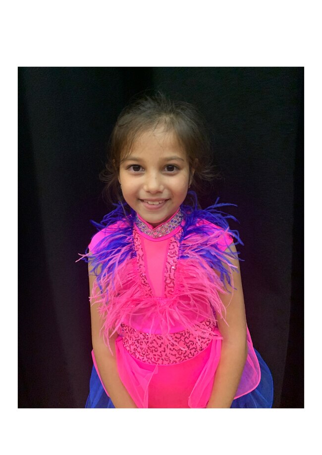 Asha began dancing at their studio in late 2019 and was the student of the year in 2021.