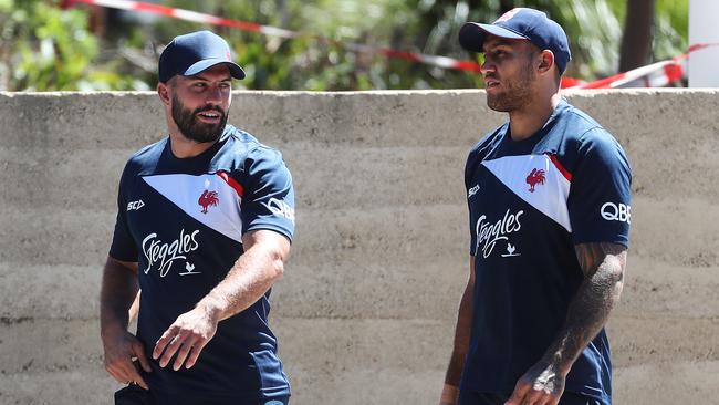 Sydney Roosters signing James Tedesco walks to a closed training session at Moore Park with Blake Ferguson. Picture: Brett Costello