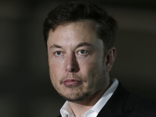 FILE- In this June 14, 2018, file photo, Tesla CEO and founder of the Boring Company Elon Musk speaks at a news conference in Chicago. Tesla is suing a former employee at its Nevada battery factory alleging that he hacked into the manufacturing computers and disclosed confidential trade secrets. The federal lawsuit filed Wednesday, June 20, contends that Martin Tripp of Sparks, Nev., also made false claims to the media about information he stole, including claims that the company used punctured battery cells in the Model 3 electric car. (AP Photo/Kiichiro Sato)