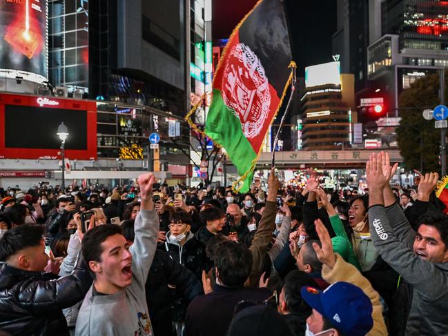 Locals and tourists celebrate the start of the New Year at Shibuya Crossing in Tokyo. Picture: AFP