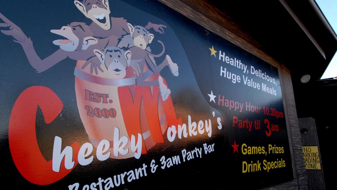 The signage for The Cheeky Monkey Bar in Byron Bay on January, 2007.