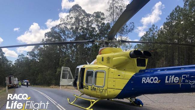 A man in his mid 20s is in a critical condition after being hit by a car at Glasshouse Mountains and carried 50m on the bonnet before being thrown into a gully.