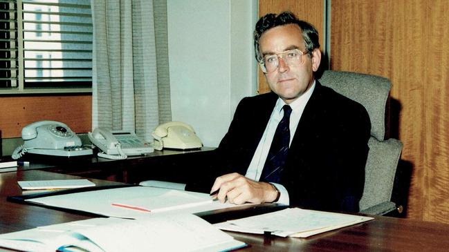 Paul Dibb, Deputy Secretary of Defence (Strategy and Intelligence), in his office circa the time of the writing of the White Paper 1987