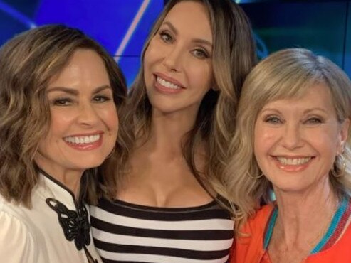 Ms Wilkinson posted a montage of photos on Instagram after announcing her contract had ended, including this shot with Olivia Newton-John (right) and daughter Chloe Lattanzi. Picture: Instagram