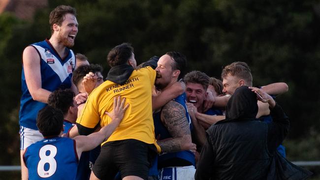 Bradley Rayson is swamped by Kenilworth teammates after his match-winning goal on Saturday. Picture: Christine Brown