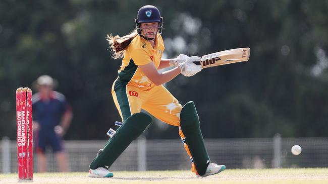 North Coastal’s Lara McMillan cuts a shot away. Picture: Sue Graham