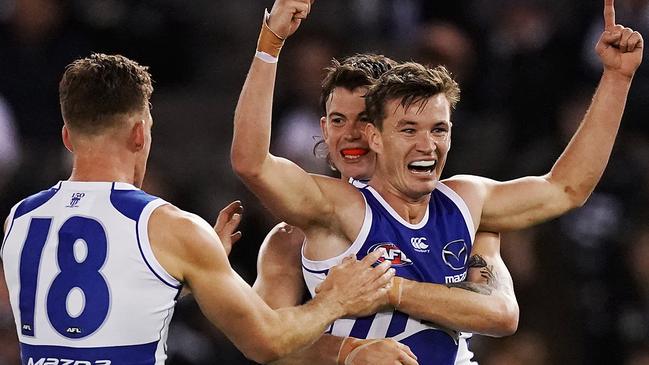 Kayne Turner celebrates a goal with Jasper Pittard and Shaun Atley. Picture: Getty Images