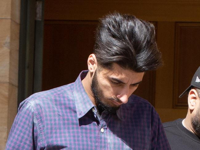 Prabnoor Singh leaves Adelaide Magistrates Court today. (Purple long sleeve shirt )He is facing a charge of causing death by dangerous driving over a crash which killed a nurse at Pooraka. Tuesday, April 18, 2023 Picture: Brett Hartwig