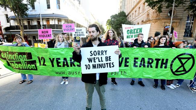 Extinction Rebellion protestors in Brisbane’s CBD on July 11. Picture: AAP/Dave Hunt