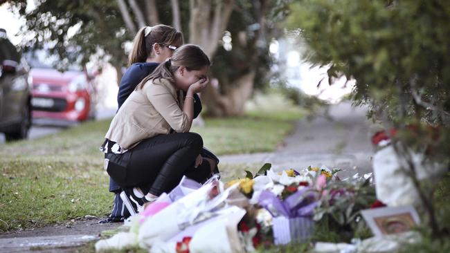 Friday 07 2018 Locals sobbed and sought comfort from loved ones as they left flowers in a tribute outside the house in which Jennifer Edwards and Jack Edwards were shot dead by their father John Edwards, 107 Hull Road, West Pennant Hills NSW. Picture: Flavio Brancaleone