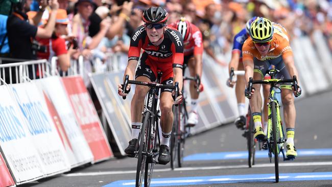 **CORRECTING CAPTION OF IMAGE ID: 20160121001220652199** Australian rider Rohan Dennis (left) of team BMC, followed by overall leader Jay McCarthy (right) of team Tinkoff, crosses the finish line of the Tour Down Under in Adelaide, Thursday, Jan. 21, 2016. (AAP Image/Dan Peled) NO ARCHIVING, EDITORIAL USE ONLY