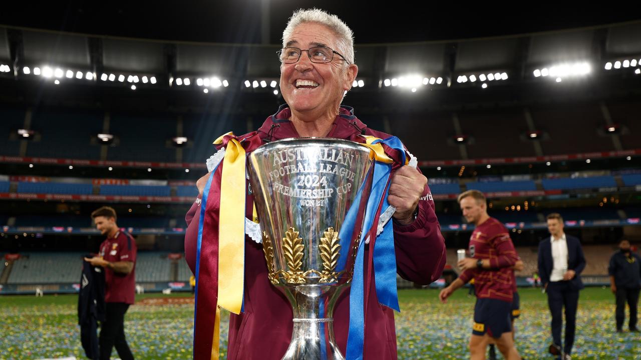 MELBOURNE, AUSTRALIA - SEPTEMBER 28: Chris Fagan, Senior Coach of the Lions poses with the Premiership Cup during the 2024 AFL Grand Final match between the Sydney Swans and the Brisbane Lions at The Melbourne Cricket Ground on September 28, 2024 in Melbourne, Australia. (Photo by Michael Willson/AFL Photos via Getty Images)