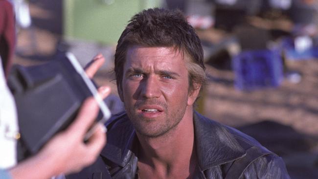 Mel Gibson on the set of Mad Max 2: The Road Warrior, photo courtesy of Lloyd Carrick