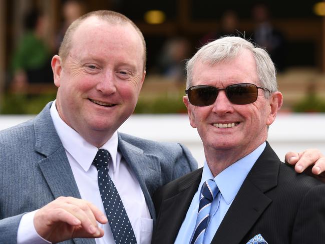 Trainers Wayne Hawkes and John Hawkes pose after Wild Planet won race 5, the Furphy Ale March Stakes, during Super Saturday at Flemington Racecourse in Melbourne, Saturday, March 7, 2020. (AAP Image/Vince Caligiuri) NO ARCHIVING, EDITORIAL USE ONLY