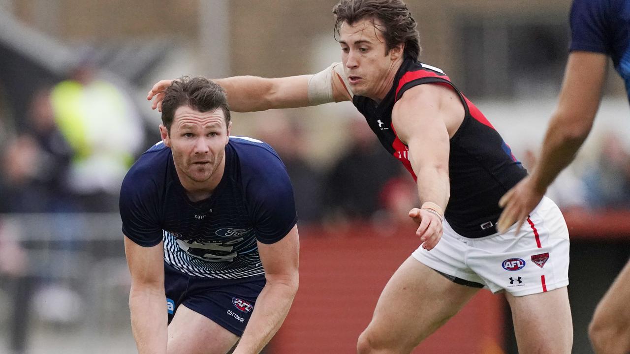 Patrick Dangerfield and Andrew McGrath in action in the 2020 pre-season competition.