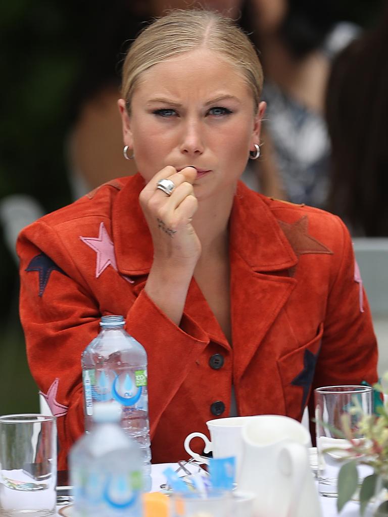 As Scott Morrison addressed the crowd Grace Tame did not look impressed. Picture: NCA NewsWire/Gary Ramage