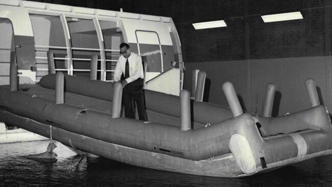 Air safety pioneer John Grant tests his inflatable escape slide in Sydney in 1965.