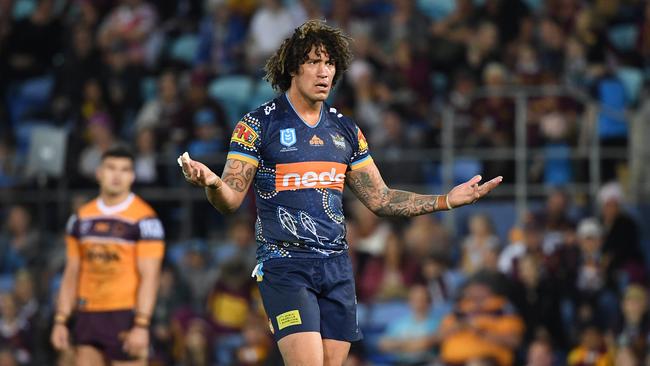 Titans player Kevin Proctor gestures towards the bench during interchange confusion during the Round 19 NRL match between the Gold Coast Titans and the Brisbane Broncos at Cbus Super Stadium on the Gold Coast, Saturday, July 27, 2019. (AAP Image/Dave Hunt) NO ARCHIVING, EDITORIAL USE ONLY