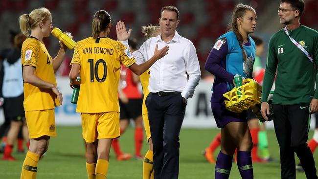 Alen Stajcic celebrates with his players after a win. Picture: Getty Images 