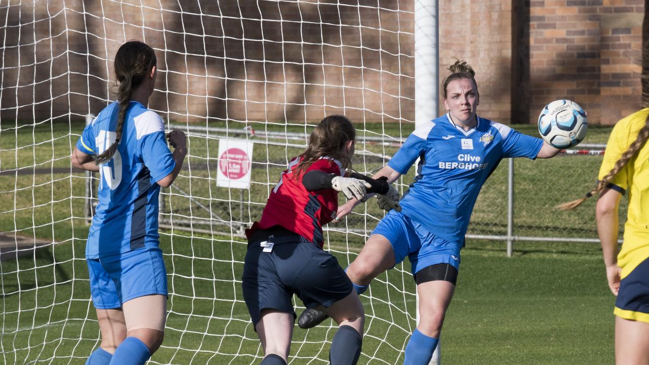 South West Queensland Thunder’s Madison Franke clears a shot off the line.