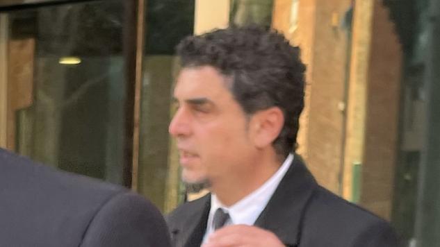 Former southwest Sydney English teacher Vasilious Kafataris (Centre) leaves Parramatta District Court with his barrister Rory McCrudden  (front) following the second day of his trial.