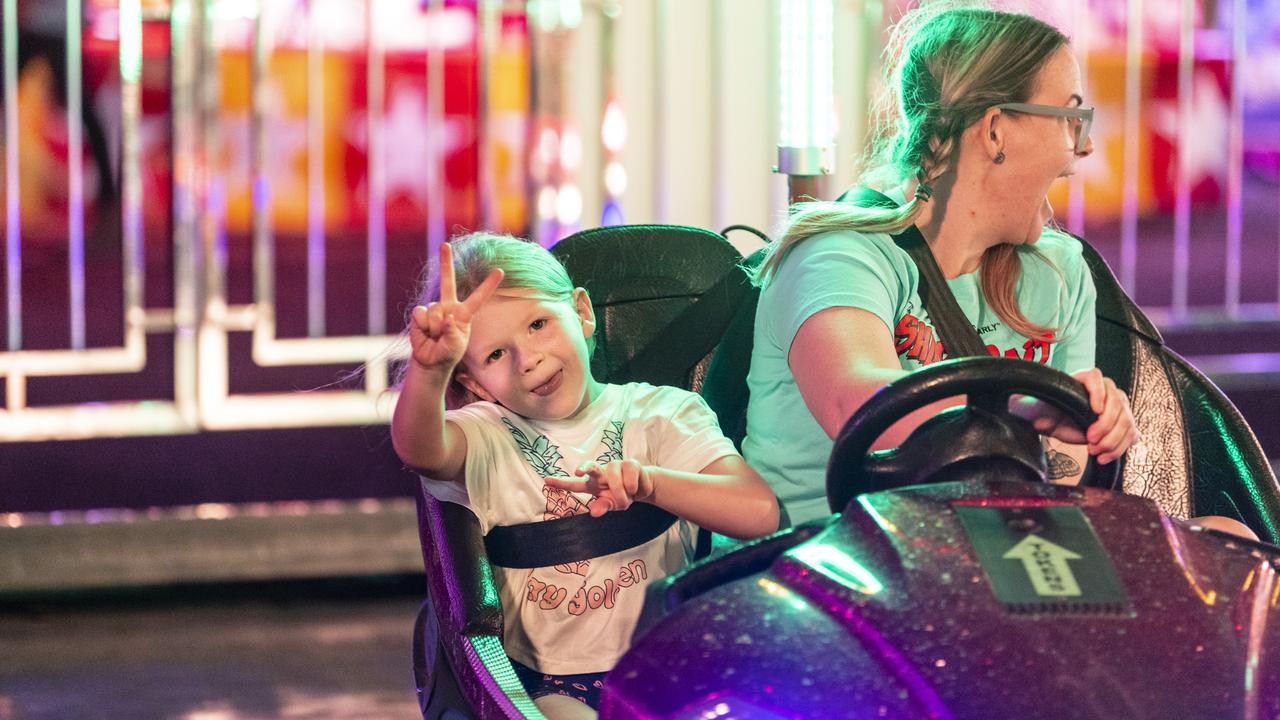 Billie Hopkinson with mum Betty Hopkinson on the dodgem cars at Toowoomba Royal Show, Thursday, March 30, 2023. Picture: Kevin Farmer