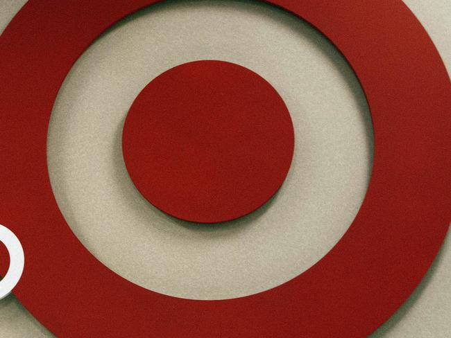 (FILES) This November 17, 2012 file photo shows the Target logo at a store in Stamford, Connecticutt. Giant US retailer Target -- the store with the bull's-eye as a logo -- says it does not want customers running around its shops carrying guns, even if it is legal. Target announced July 2, 2014 it would "respectfully request" shoppers not to bring firearms into its stores, "to create an atmosphere that is safe and inviting for our guests and team members." With 44 of the 50 US states permitting people to openly carry handguns day-to-day, interim chief executive John Mulligan said in a statement that Target, which has nearly 1,800 stores in the United States, seeks to adhere to local regulations. AFP PHOTO/DON EMMERT