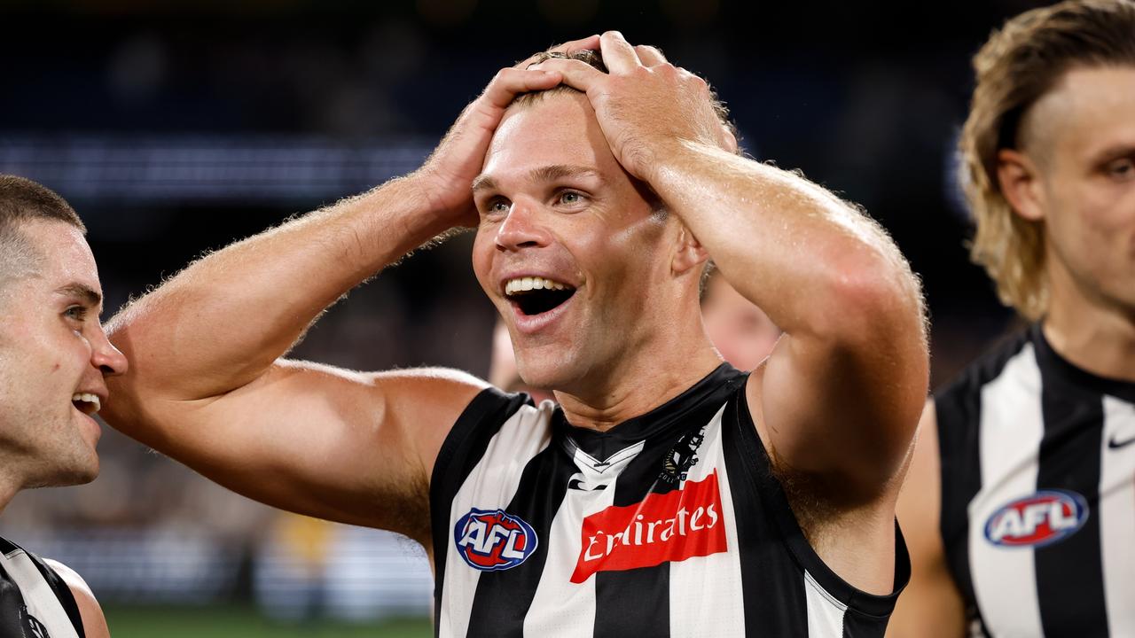 MELBOURNE, AUSTRALIA - MARCH 15: Dan Houston of the Magpies celebrates after a win during the 2025 AFL Round 01 match between the Collingwood Magpies and the Port Adelaide Power at the Melbourne Cricket Ground on March 15, 2025 in Melbourne, Australia. (Photo by Dylan Burns/AFL Photos via Getty Images)