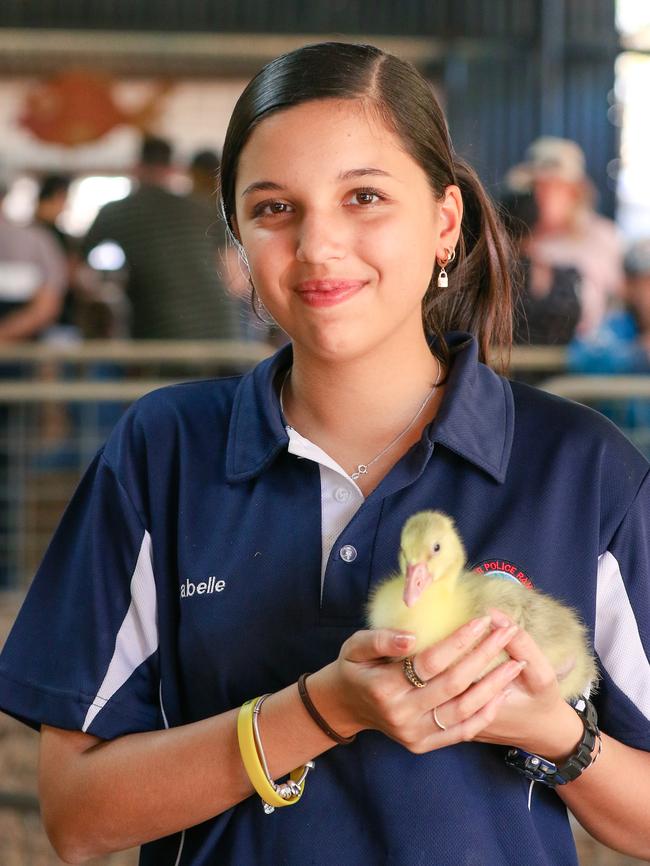 Annabelle Lampakthsun, 14, enjoying day two of the Royal Darwin Show. Picture: Glenn Campbell