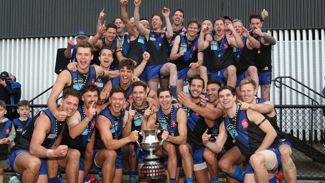 Uni Blues celebrate last year’s VAFA flag. The league has planned for a competition postponement and disbandment in wake of the coronavirus. Picture: Hamish Blair