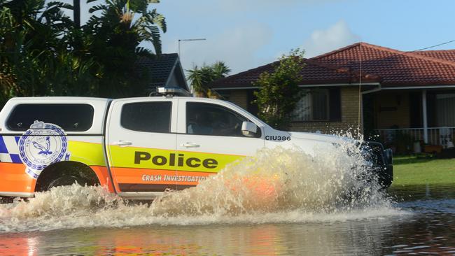 Police drive through flooding on Fox Street, Ballina near Ballina Fair Shopping Centre on Tuesday morning, March 1, 2022. Picture: Liana Boss