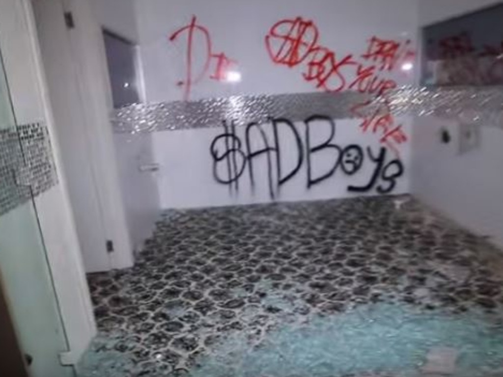 Shattered glass and graffiti litter the Big Brother house. Picture: YouTube/MuiTube