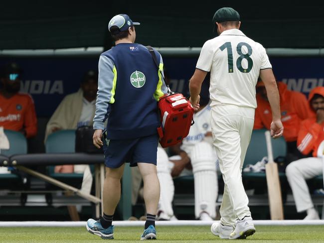 Michael Neser walks from the field with an apparent calf injury. Picture: Getty