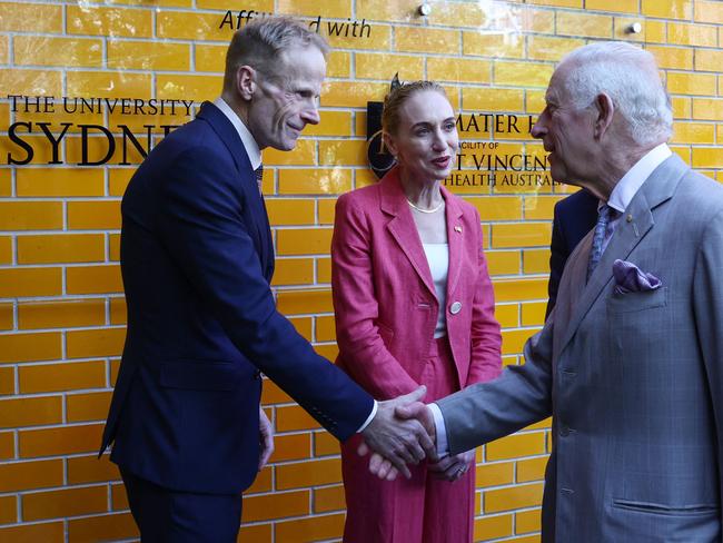 Professor Richard Scolyer and Professor Georgina Long meet King Charles during his 2024 Australian visit. Picture: AFP