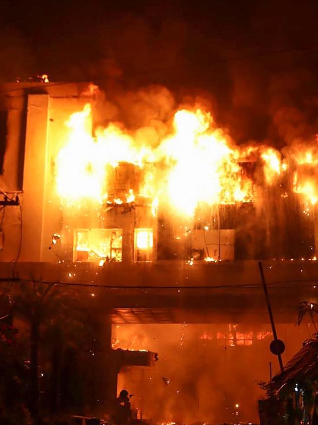 A major fire burns through the Grand Diamond City hotel-casino. Picture: AFP.