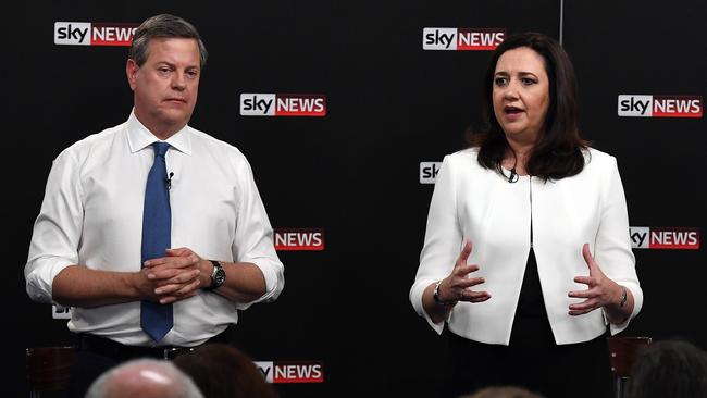 The LNP, long the favourite, has run a smooth campaign, but it enters the last week behind Labor. Above, Tim Nicholls with Annastacia Palaszczuk. Picture: AAP