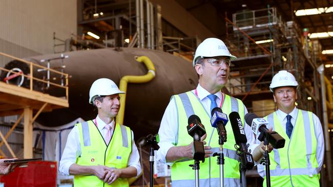 Premier Steven Marshall holds a press conference at ASC after the joint Australia, USA and British nuclear-powered submarine agreement, flanked by Finance Minister Simon Birmingham (left) and ASC chairman Bruce Carter (right). Picture Kelly Barnes