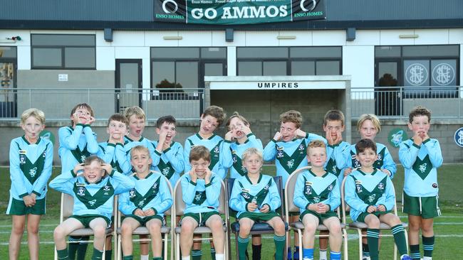 Geelong Ammos Bain under-9 football team pull their funniest faces. Picture: Alison Wynd