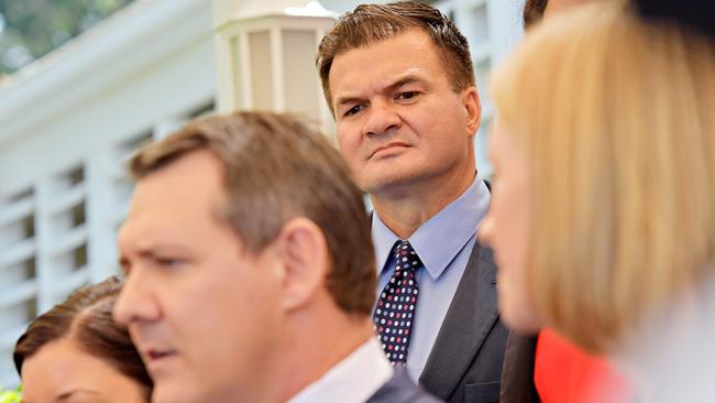 Sacked former Labor minister Ken Vowles looks on at Chief Minister Michael Gunner