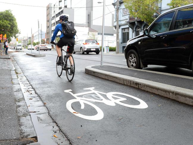 Yarra Council voted to extend the Copenhagen bike lanes on Wellington St from Gipps to Johnston streets. Traders are against the lanes as they remove carparking. Cyclists in Wellington st Collingwood. Picture: Josie Hayden