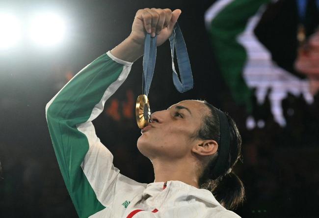 Algerian boxer Imane Khelif celebrates winning gold at the 2024 Olympics in Paris