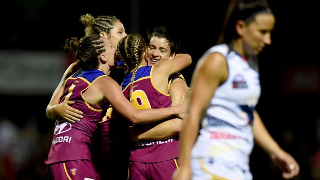 Brisbane Lions players celebrate a win. Picture: Sam Wundke