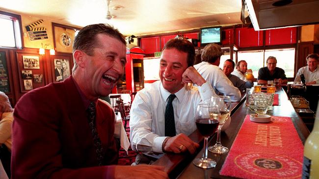 Jockeys Malcolm Johnston and Jim Cassidy enjoy a drink in 1997.