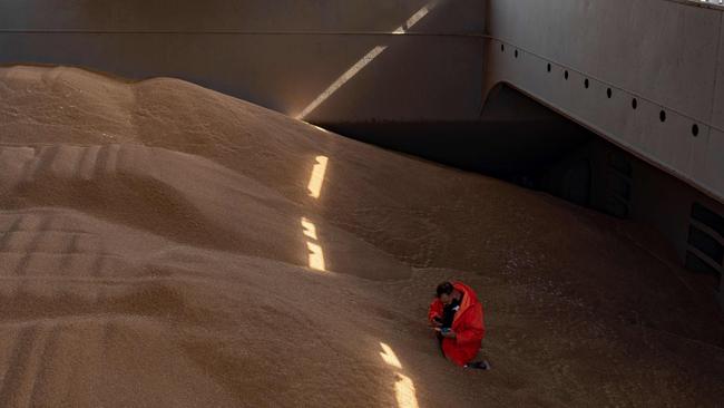 A crew member prepares a grain analysis for members of the Joint Coordination Center (JCC) onboard the Barbados-flagged ship ‘Nord Vind’ coming from Ukraine loaded with grain. Picture: AFP