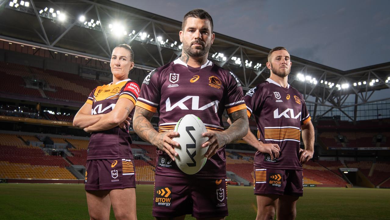 Ali Brigginshaw, Adam Reynolds and Kurt Capewell model the Broncos’ 2022 playing kit.