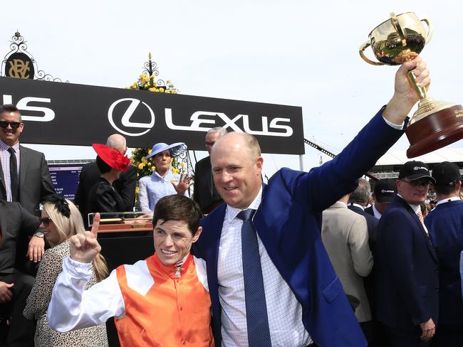 MELBOURNE, AUSTRALIA - NOVEMBER 05: Craig Williams holds the Melbourne Cup with trainer Danny O'Brien after winning with Vow And Declare during 2019 Melbourne Cup Day at Flemington Racecourse on November 05, 2019 in Melbourne, Australia. (Photo by Mark Evans/Getty Images)