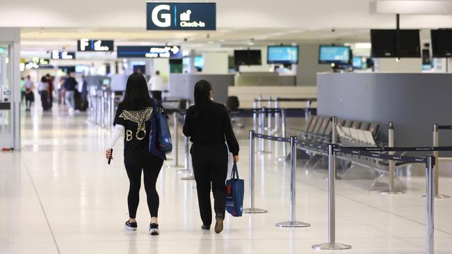 A near empty departures hall at Sydney International Airport on March 10. Picture: NCA NewsWire / Damian Shaw